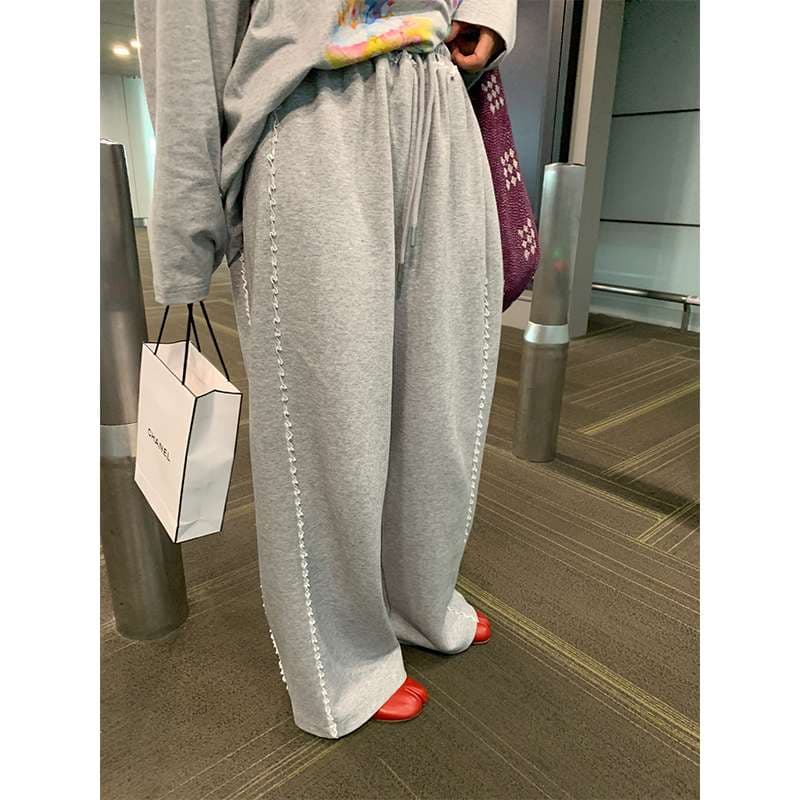 30代ファッション ゆったりシルエット飾り縫いパンツ